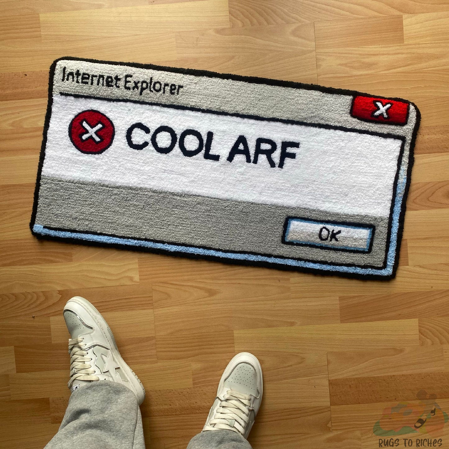 ‘COOL ARF’ HANDTUFTED RUG
